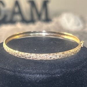 10k Yellow Gold Diamond Cut Bangle Bracelet.